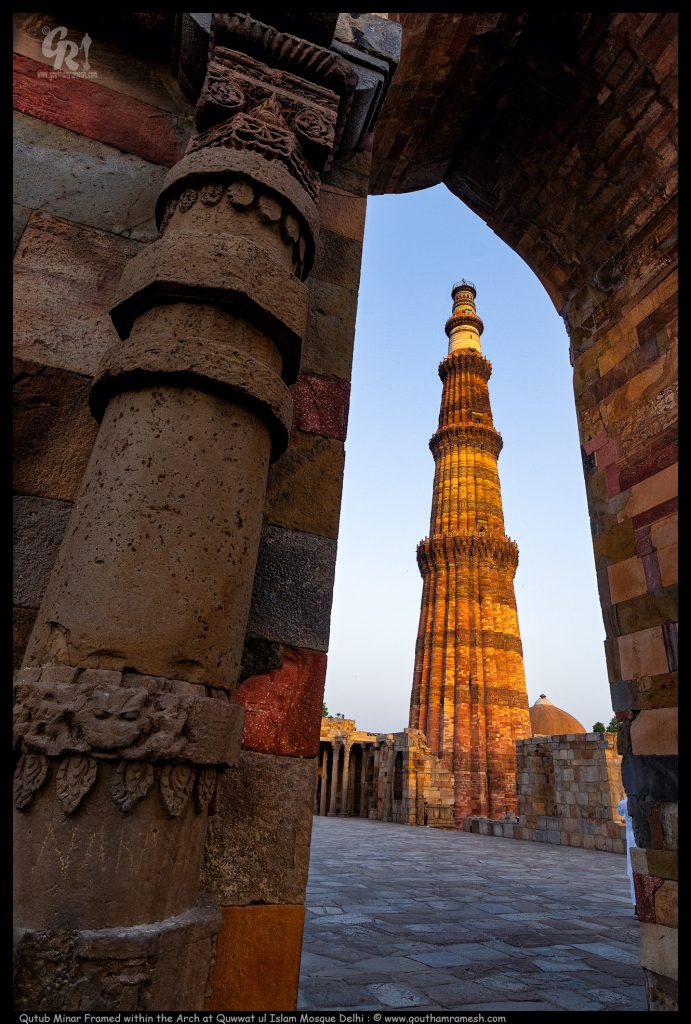 Qutub Minar Framed within the Arch at Quwwat ul Islam Mosque Delhi